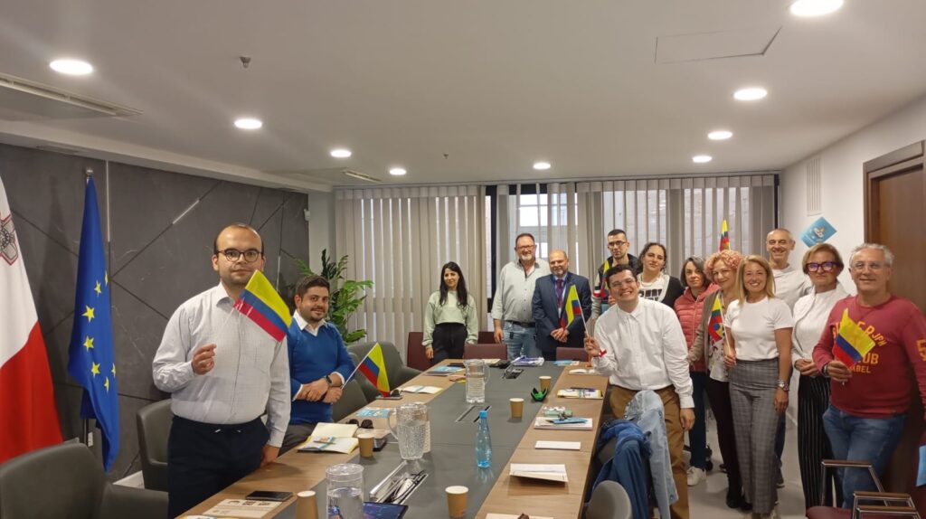 The two images show participants of groups 1 and 2 waving Colombian flags as part of the cultural track of this Spanish language training initiative by the Ministry of Foreign Affairs of Colombia in collaboration with the Office of the Deputy Prime Minister and Ministry of Foreign Affairs and Tourism of Malta, and the Institute for the Public Services, to mark 40 years of diplomatic relations. Participants are public officers; the trainer, generously provided by the government of Colombia, is Professor Jose Luis Duarte Rodríguez.